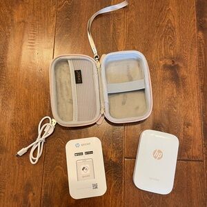 White HP Sprocket Portable Photo Printer with Rose Gold Case and Charger